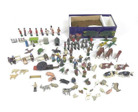 A collection of lead figures, including a Britains Shepard boy, three Britains benches with seated people, a Charbens farmer 