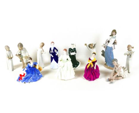 A collection of figurines, including three early Lladro bedtime figures, 'Girl in nightdress with candle', 4868, boy sitting 