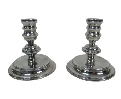 A collection of silver plate, including a pair of Mappin and Webb short candlesticks, 11.5cm high, a five piece tea service, 