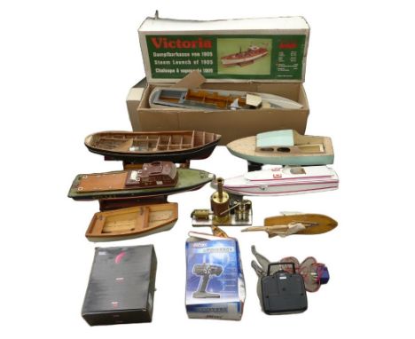 A collection of nine model boats, including a partially assembled Krick Victoria steam boat kit, a radio controlled boat mark