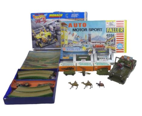 A collection of toys, including a Tipp &amp; Co. 'Brooklands Speedway' set containing two cars (an Auto Union and possibly a 