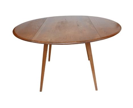 An Ercol circular elm and beech drop leaf dining table, circa 1970, No 384, 'Dining Table', 123 by 113 by 71.5cm high 