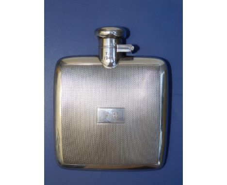 An engine turned square silver hip flask - 'TI 1940' &amp; 'FR', D&amp;F, Birmingham 1940, 4.2" overall.