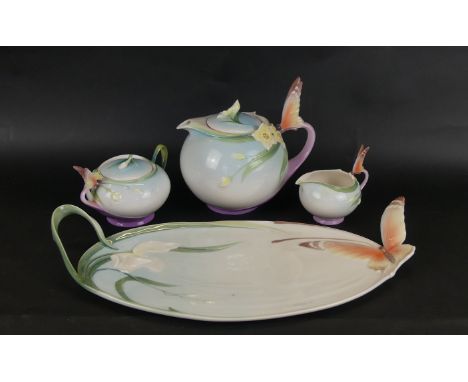 A contemporary Art Nouveau style three piece tea service and tray
By Franz 
