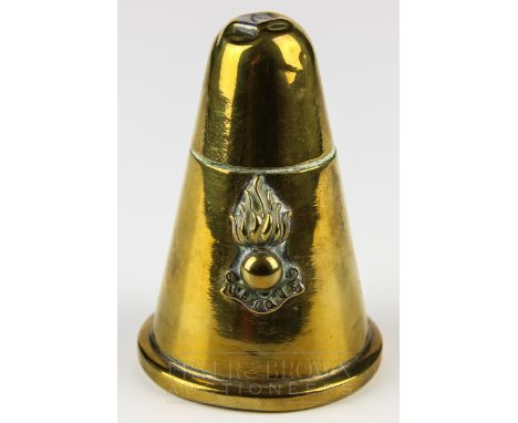 A Royal Artillery Trench Art brass table cigarette lighter, of conical form applied with flaming grenade badge above UBIQUE, 