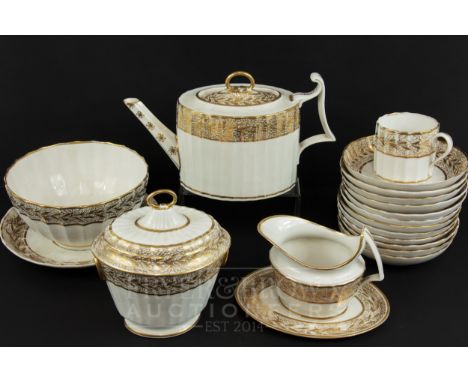 A Derby part tea and coffee service, pattern 561, the white ground decorated with bands of gilding, puce mark with crown abov