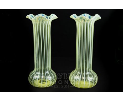 A pair of Whitefriars Walsh straw opal glass vases, of cylindrical form with swollen base and frilled rims, 30cm high approx.