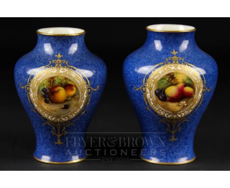 A pair of Royal Worcester squat baluster vases, signed C. Cresse, powder blue ground painted with reserves of fruit, shape no