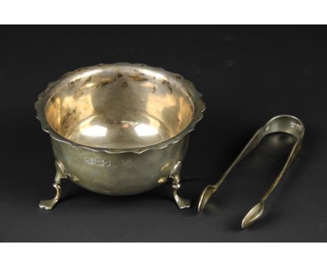 A silver sugar bowl, William Hutton &amp; Sons, London 1898, 71grs; and a pair of silver sugar tongs, 19grs (2)