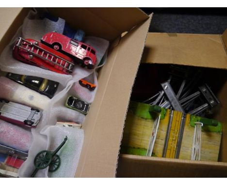 Box containing vintage Dinky and Corgi model vehicles together a box of model railway track including level crossing