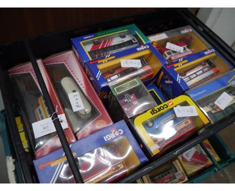 Crate containing a collection of boxed model vehicles including Corgi