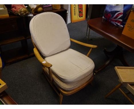 Ercol elm armchair and a spindle back Windsor shape side chair