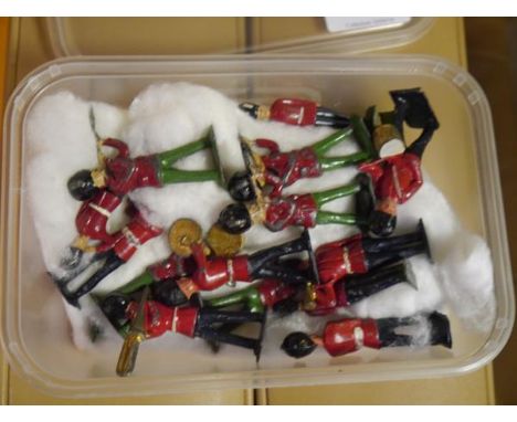 A group of Guardsman model soldiers, probably Timpo, including bandsman, together with a sentry box (14); and six Crescent mo
