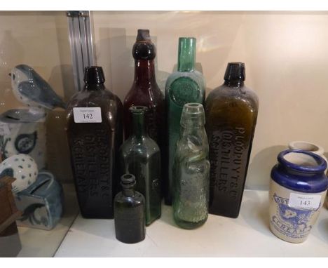 Collection of miscellaneous glass bottles including P. Loopuyt and Company distillers, Schiedam and Gordons Special dry gin