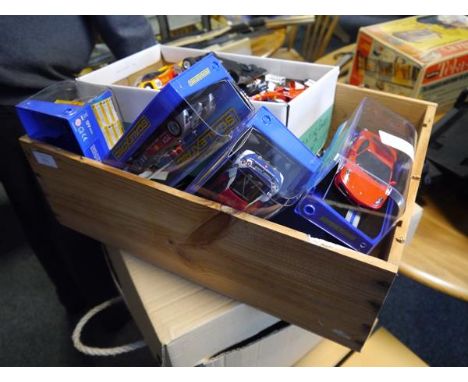 Two boxes containing a quantity of Scalextric model cars and track