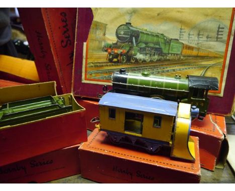 Case containing a quantity of vintage Hornby boxed model rail including the Hornby train number 0 goods set,  number 2 Specia
