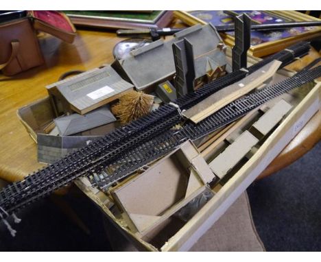 Group of cardboard station buildings and model rail track