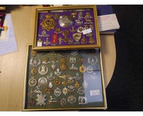A collection of British military cap, shoulder and cross-belt badges, mounted in two frames, including the 19th Princess of W