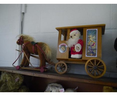 A Steiff "Santa's Express", comprising horse-drawn carriage with Santa teddy, in its original wooden box. 