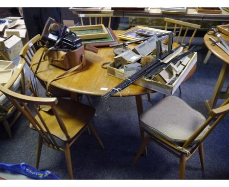 Mid 20th century Ercol elm kitchen dining table with five spindle back dining chairs