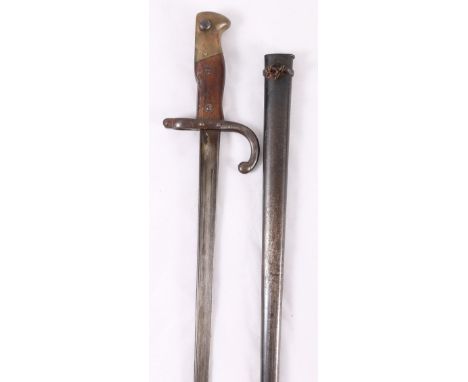 French 1874 pattern sword bayonet having tapering T - form blade with edge marked for St Etienne May 1879, hook quillon, wood