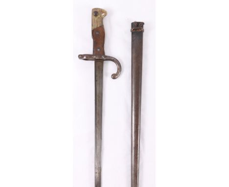 French 1874 pattern sword bayonet having tapering T - form blade with edge marked for St Etienne May 1879, hook quillon, wood