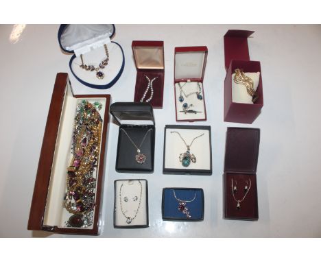 A box of decorative jewellery to include necklaces, necklace and ear-ring sets etc.