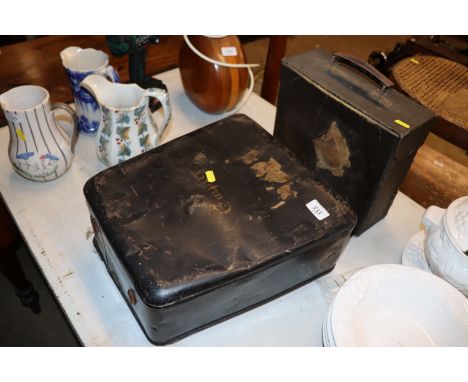 A vintage portable typewriter and a case of 78rpm records 