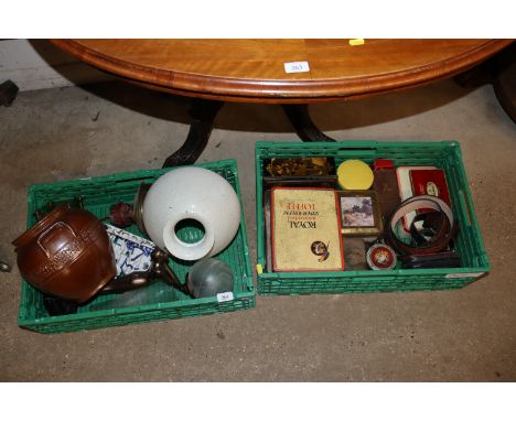 A box of miscellaneous old advertising tins and a box of various china, metal ware etc. to include an Art Deco style figural 