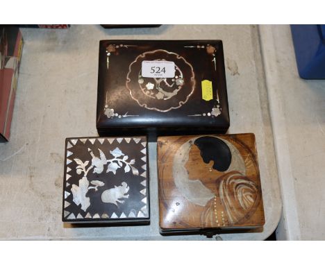 A small Art Deco wooden trinket box; and two Oriental lacquered boxes 