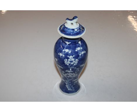 A Chinese blue and white Hawthorn pattern vase and cover, having double ring mark to base AF