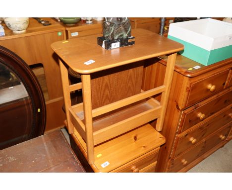 An Ercol style occasional table / magazine rack