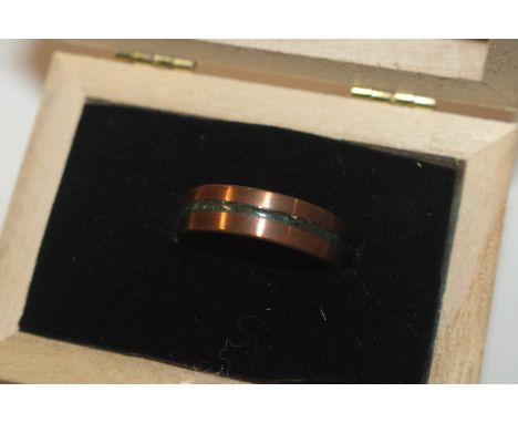 A copper ring with emerald and malachite band, ring size R/S