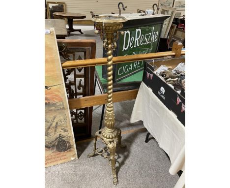 A 19th century cast bronze torcher stand, with spiral twist centre column and tripod base, height 122cmBronze is all in good 