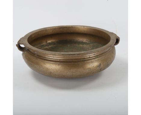 A Chinese bronze incense burner with ring handles, diameter 21cm