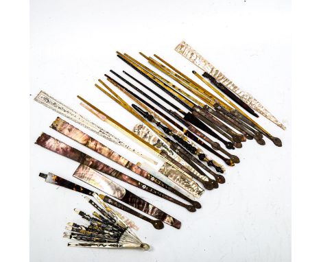 A group of 19th century mother-of-pearl and tortoiseshell fan parts 