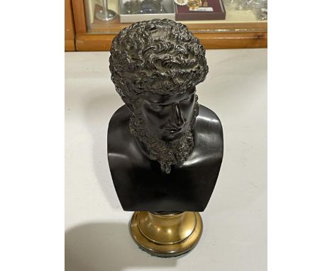 An early 19th century Italian Grand Tour bronze bust of Lucius Verus, mounted on gilt-bronze socle base, height 24cm 