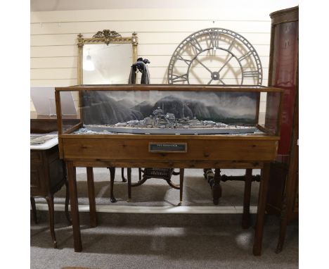 A large scale model of The Bismarck, in floor standing glazed wooden display case, 144cm 