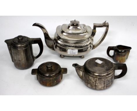 A FRENCH ART DECO WHITE METAL TEA SET to include tea pot, water jug, milk jug and sugar bowl, the tea pot 18cm wide together 