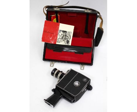 A BOLEX PAILLARD K2 ZOOM REFLEX AUTOMATIC CINE CAMERA with its original fitted case and instruction manual 