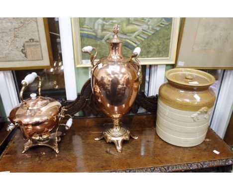 A 19TH CENTURY COPPER TEA URN or samovar with a milk glass handles and flame finial to the lid 52cm high together with a Vict