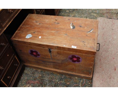 A PINE TRUNK, 77cm wide together with a 19th century oak tilt top tripod table, the top 81cm diameter (2)