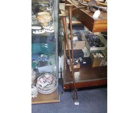 A VINTAGE RIDING CROP, two post horns, a bugle and a presentation sword (5)