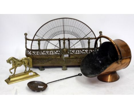 A REGENCY PIERCED BRASS FENDER with fan shaped guard, 69cm wide together with a 19th century copper coal scuttle, a brass doo