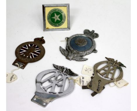 FOUR VINTAGE CAR BADGES including a Royal Automobile Club numbered MCD4030 to the reverse; a pierced AA badge numbered 186752