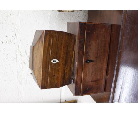 A GEORGE III MAHOGANY TEA CADDY, 26.5cm wide together with a 19th century rosewood sarcophagus shaped tea caddy, 19cm wide (2