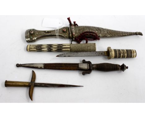 A JAPANESE BONE HANDLED SOUVENIR KNIFE, a Toledo steel knife, a Trench Art dagger and one other knife, the largest 27cm (4)