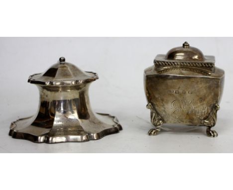 A BIRMINGHAM SILVER INKWELL STAND with capped lid and an antique Birmingham silver tea caddy standing on pad feet (2)