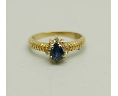 An 18ct gold, sapphire and white topaz ring, 2.6g, N 