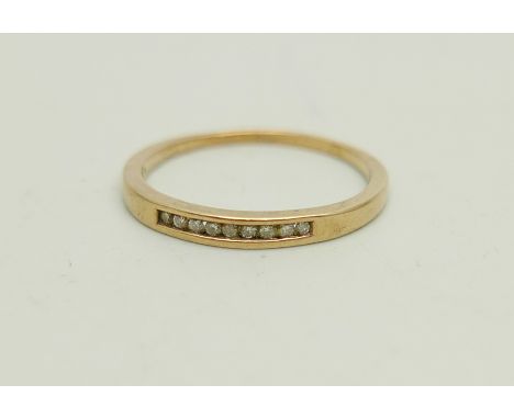 A 9ct gold ring set with small diamonds, 1.8g, R 